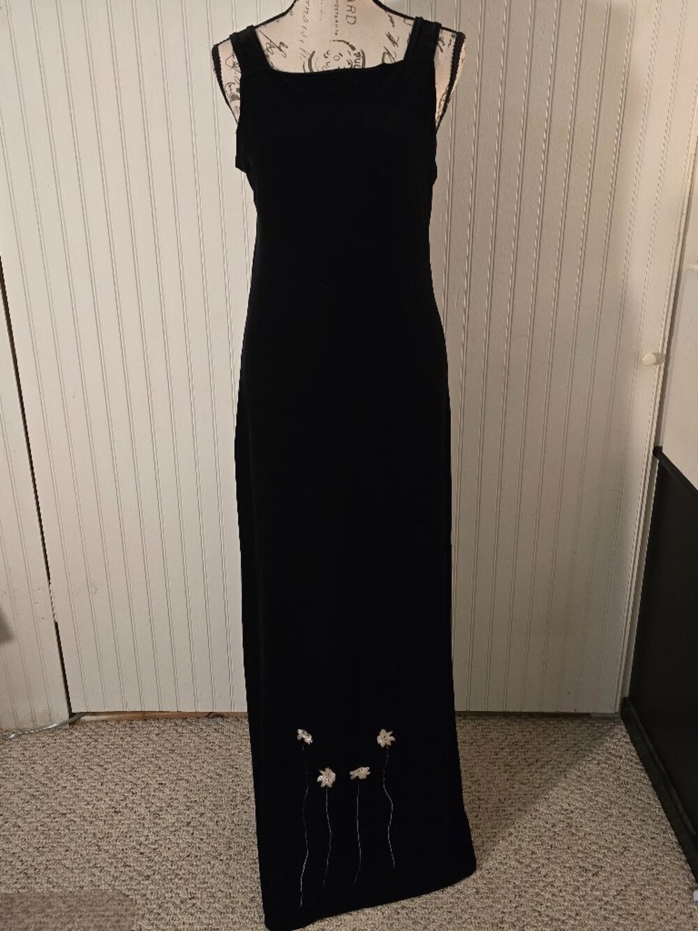Black velvet gown with embroidered silver flowers